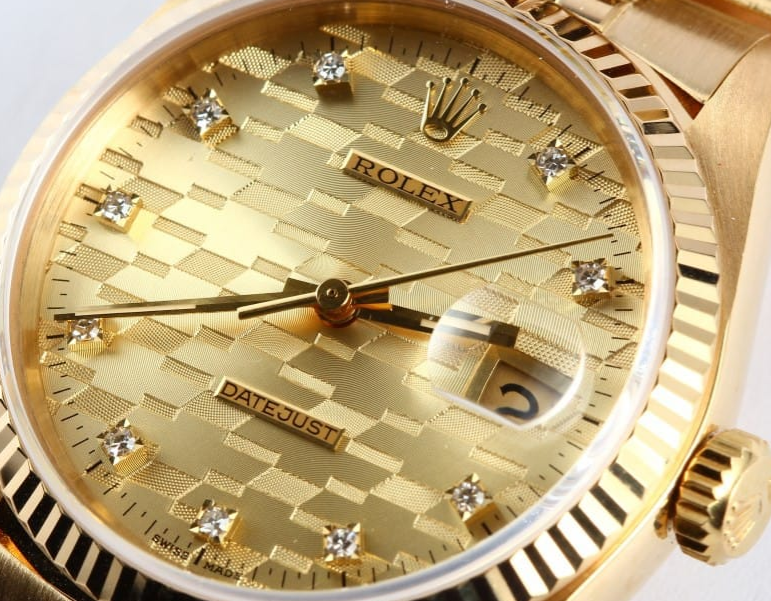 Yellow Gold Chevrolet Rolex with champagne