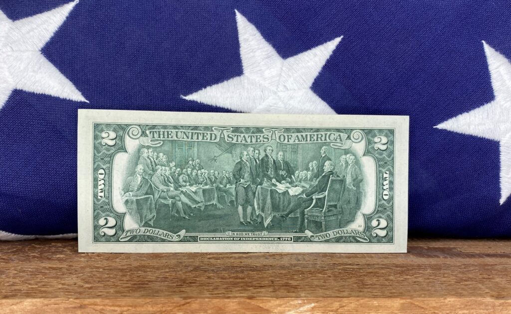 reverse side of the 1976 paper currency